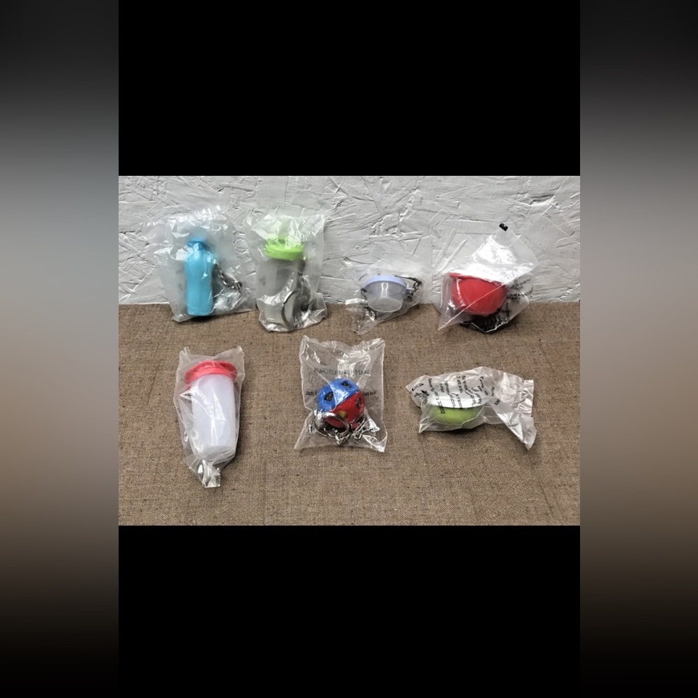 New Tupperware Lot of 7 (6 Keychains & 1 Open House Salt & Pepper) No Duplicates